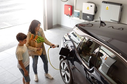 EV owner charging their vehicle
